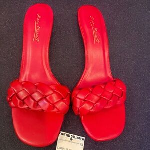 Red, open toe heel
Sandals